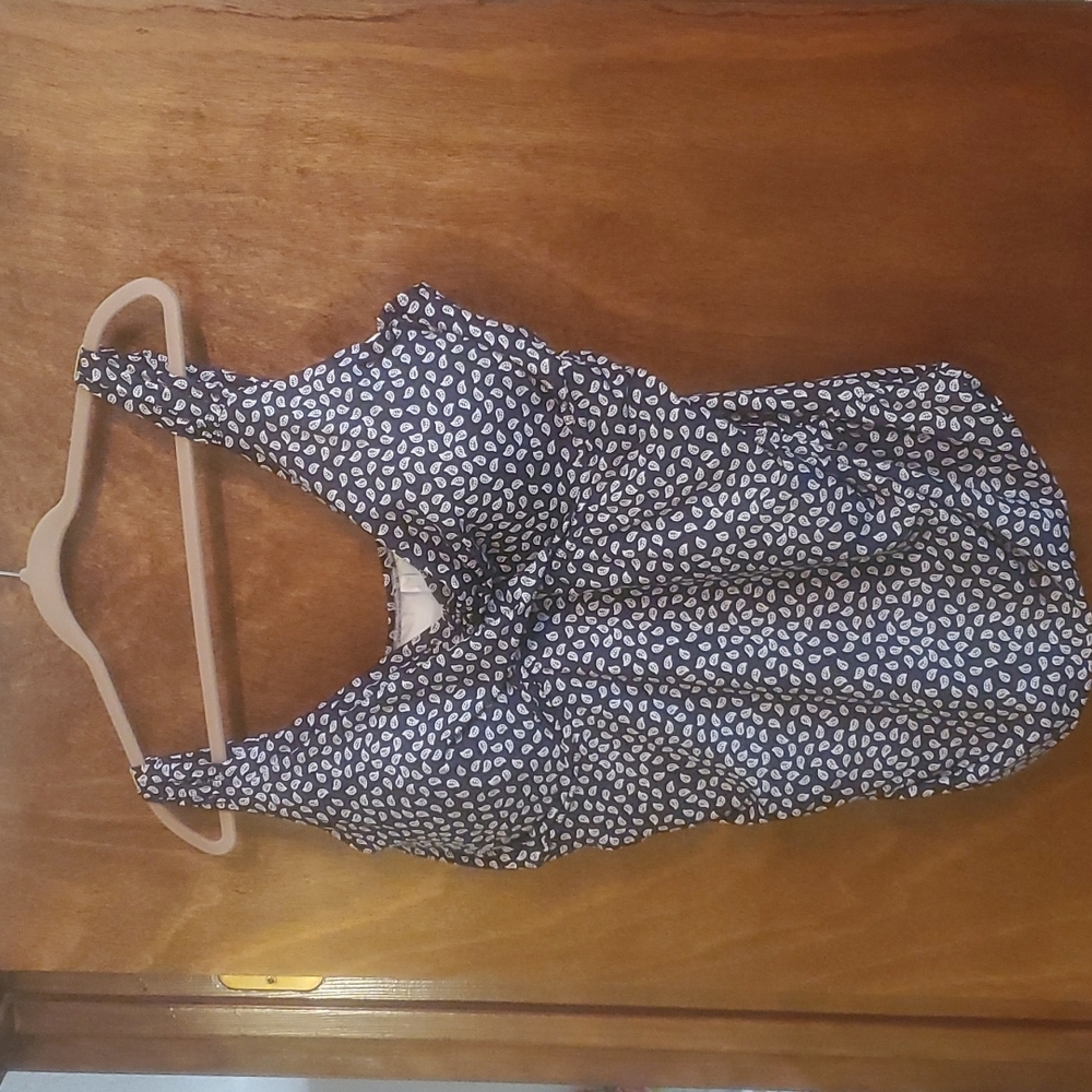 Tankini with twisted bandeau top only. Has built-in, padded, underwire bra.